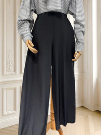 Pantaloni evazați cu talie înaltă și buzunare laterale mărimea XS