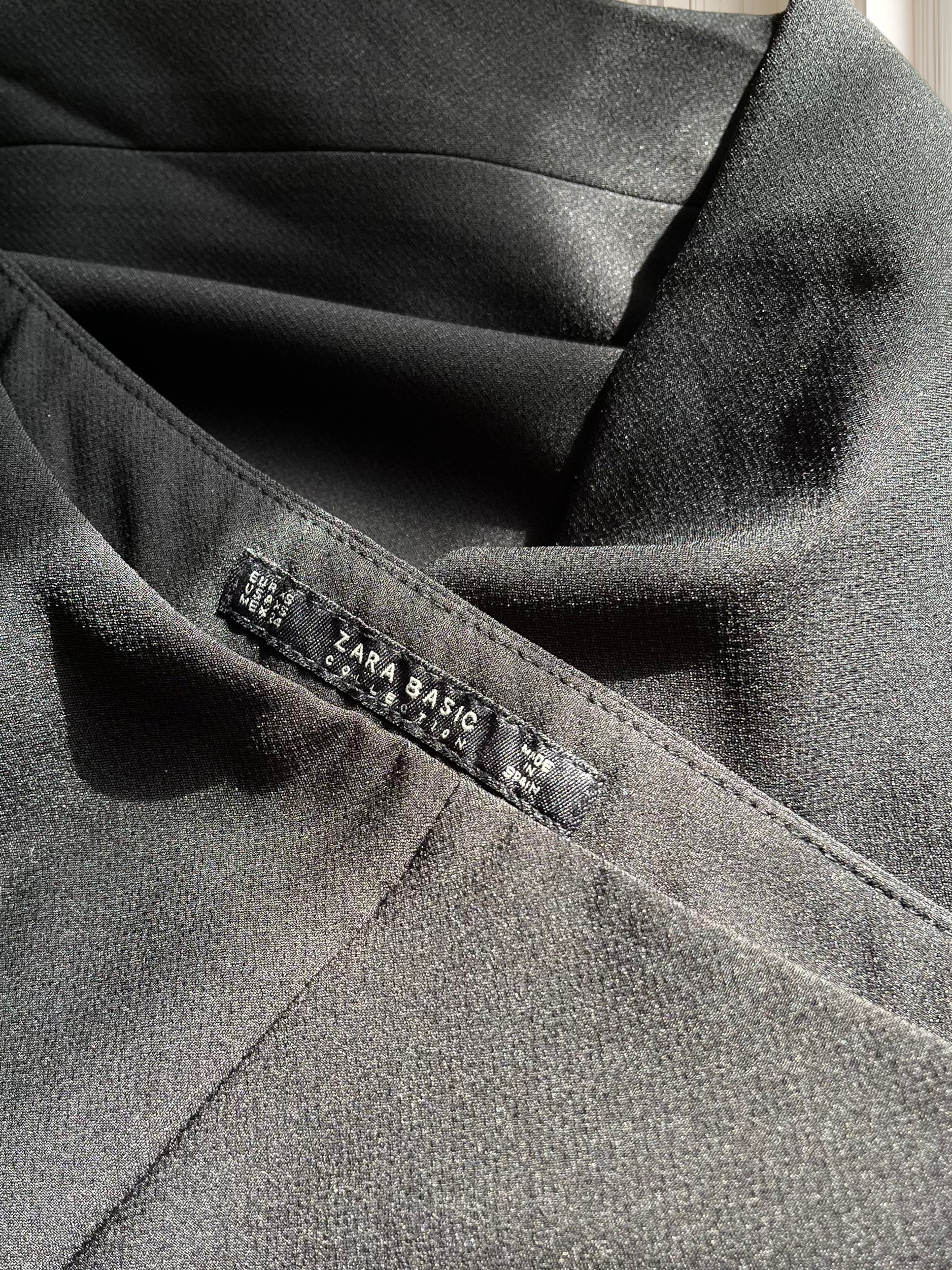 Pantaloni evazați cu talie înaltă și buzunare laterale mărimea XS